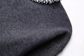 SUÉTER COM ESTRASS